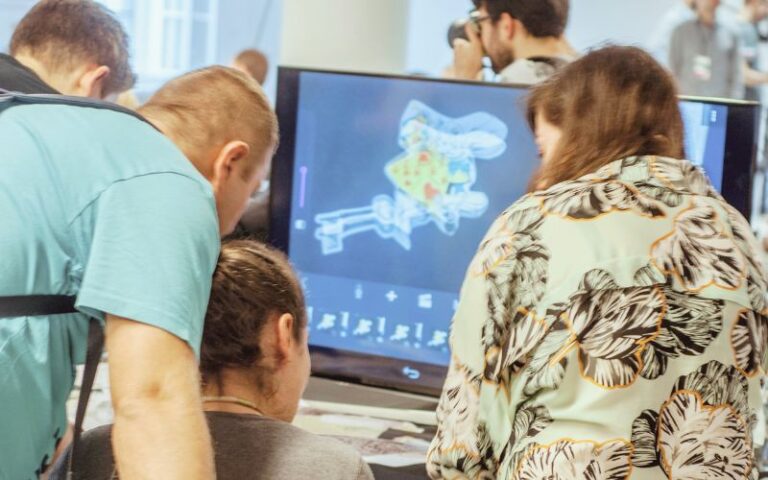 Mobile Culture Online Course landing page photo showing people creating stop motion animation during the workshop